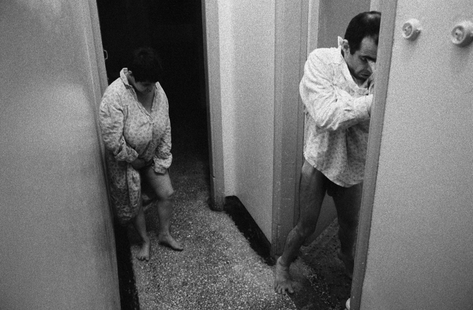 Greece, Mytilini island, Agiassos, The Sanatorium ìI Theomitorî, 1999Because the lavatories no longer work, Ballerina and Stavroula (who came here in 1988 from the psychiatric hospital on the island of Leros) have no choice but to urinate in the corridor.GrËce, Ile de MytilËne, Agiassos, Sanatorium ìI Theomitorî, 1999Parce que les toilettes ne marchent plus, Ballerine et Stavroula (venue de líhÙpital psychiatrique de Leros en 1988) sont obligÈs d'uriner dans le couloir.  © Rip Hopkins / Agence VU
