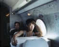 © RIP HOPKINS / AGENCE VU
HOME AND AWAY
OUZBEKISTAN, 2002

20/08/02
Alexey Khegay and Kulnazar Saribaev in a Yak-40 aeroplane between Tashkent and Nukus.
Alexey Khegay is 19 years old. He is a telecommunications student in Tashkent. His Korean grandparents were sent to Nukus in Karakalpakstan from the Russian / Chinese border by Stalin in 1937. He will leave Nukus definitively for Tashkent once he finishes his studies.
Kulnazar Saribaev is 47 years old. He is a police captain in charge of Nukus's immigration and visa department (OVIR). His father is Uzbek and his mother is Karakalpak. He wants to leave Nukus for Tashkent.
On arrival at Nukus' airport I was arrested and spent a brief spell in prison, I got out by paying a heavy bribe and had to leave the area within 24 hours.

N°10650