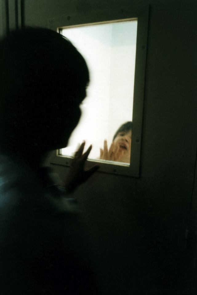 France, Seine-saint-Denis, Neuilly-sur-Marne, 1999 - Ville-Evrard Psychiatric Hospital. A patient in an isolation room.
