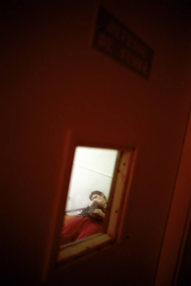 France, Seine-saint-Denis, Neuilly-sur-Marne, 1999 - Ville-Evrard Psychiatric Hospital. A patient in an isolation room.