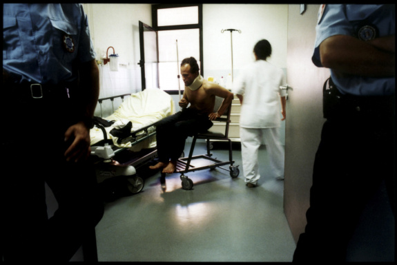 France, Marseilles, June 2002 - Emergency Room in Marseille's Nord Hospital. Illegal immigrant, under police surveillance.