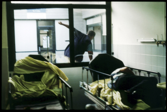 France, Marseilles, June 2002 - Emergency Room in Marseille's Nord Hospital. Fleeing patient under the influence of narcotics.