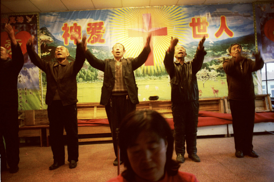 China, Datong, 2006 - Miners rehearse a show for Christmas in the protestant church of the coal mine of datong.