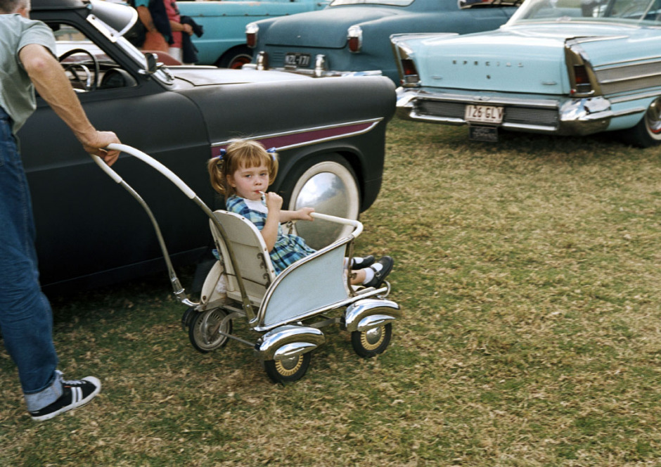 August 2004, Brisbane, Australia.Pram.Classic and custom cars parked at the GreazeFest Hot Rod Show on the last day of the 2004 festival. Many fans of the 1950s take the era very seriously, right down to their children’s clothing and the little wheels, which are just as authentic as the bigger wheels.Ao˚t 2004, Brisbane, Australie.Pram.Les voitures classiques et customisÈes sont garÈes sur le parking, le dernier jour du GreazeFest Hot Rod Show 2004. Beaucoup de fans prennent trËs au sÈrieux ce rassemblement, habillant leurs enfant comme dans les annÈes 50 et les faisant rouler dans des poussettes qui n'ont rien ‡ envier aux voitures prÈsentes.Steven Siewert / Agence VU