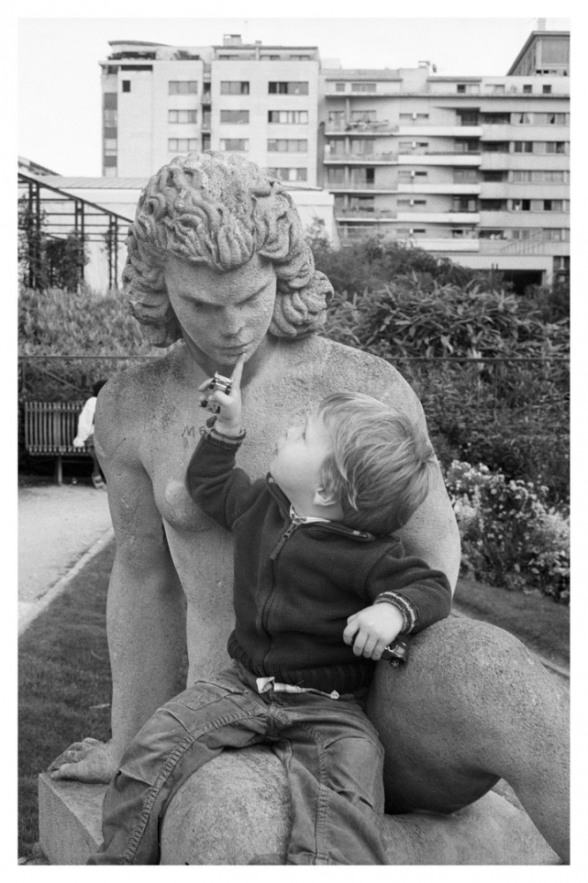 France, Paris, 2007 - Simon in a statue's arms.