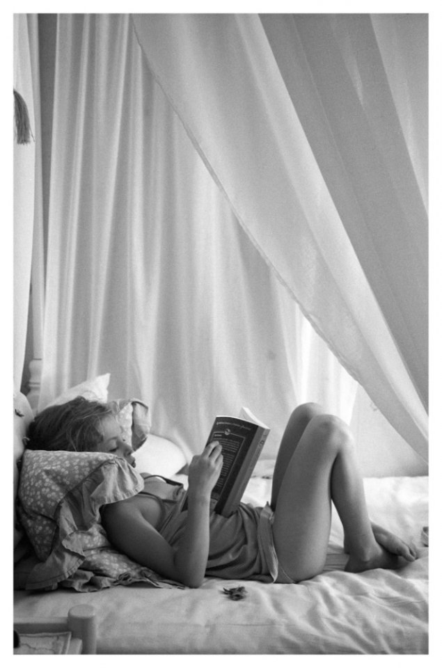 France, Corsica, August 2008 - Adèle reading.