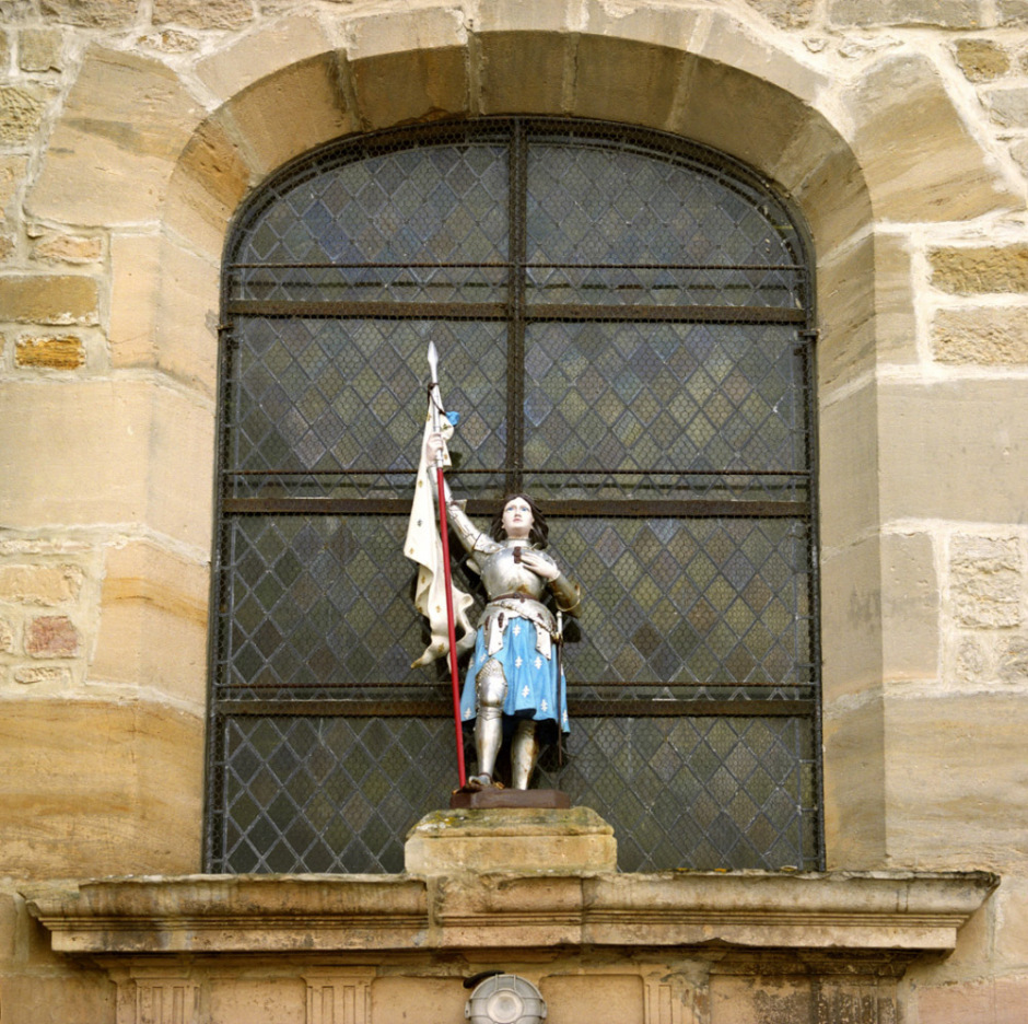 France, Saint Hurbain, December 2007. Statue of Jeanne of Arch on the church of Saint Hurbain.