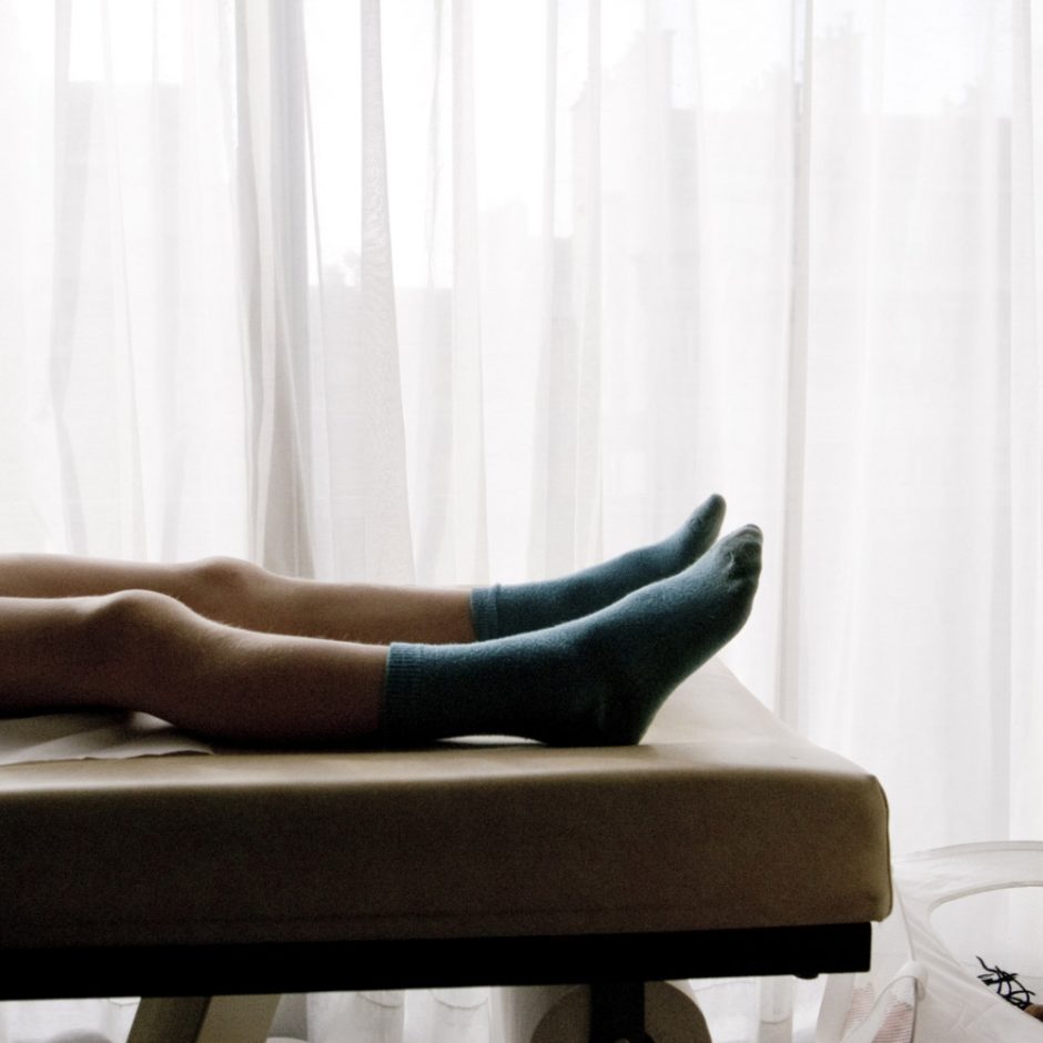 France, Paris, 2008 - Young boy in the doctor office.