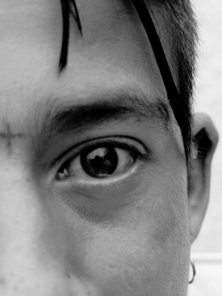 Colombia, Bogota, 2002 - 2009"Calle del Cartucho".The eye of Death.A 17-year-old professional killer. His cross-shaped tattoo is a reminder of his signature: a bullet between the two eyes.Colombie, Bogota, 2002 - 2009"Calle del Cartucho".L'oeil de la mort.Un jeune tueur ‡ gage de 17 ans. Le tatouage en forme de croix rappelle sa signature: une balle entre les deux yeux.Stanislas Guigui / Agence VU
