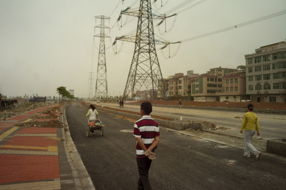 China, Xintang, May 2011 - In this expanding Chinese city, similar to thousands others, new districts are being built, fashioned in very straight lines.
