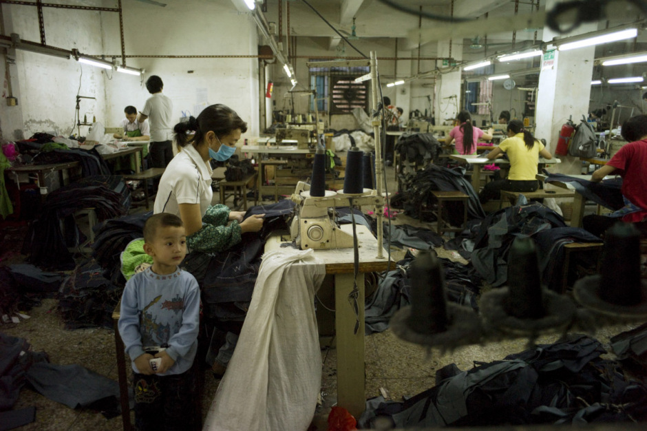 China, Xintang, May 2011 - They work 12 hours a day, seven days a week and have only one afternoon off in a month, on pay day.