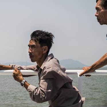 Vietnam, Min Chau, 19 April 2015Men on a boat.Vietnam, Min Chau, 19 avril 2015Hommes sur un bateau.Franck Ferville / Agence VU