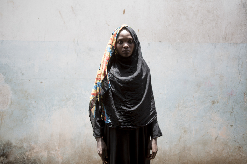 Comoros, Mohéli Island, Fomboni, October 16 2015Ramna Djamaldin, 15 years old."Last year, my parents heard that I was having a relationship with a boy and they forced us to get maried. I didn't wanted to, I wasn't ready, I tried to refuse but I was forced. I get pregnant and I have a 1 year old child now. My husband left school and he is a worker. I left school because of the baby and I am pregnant again. I intend to continue school after this second child. I regret it anyhow. Just thinking that I can't play with my school friends makes me cry."