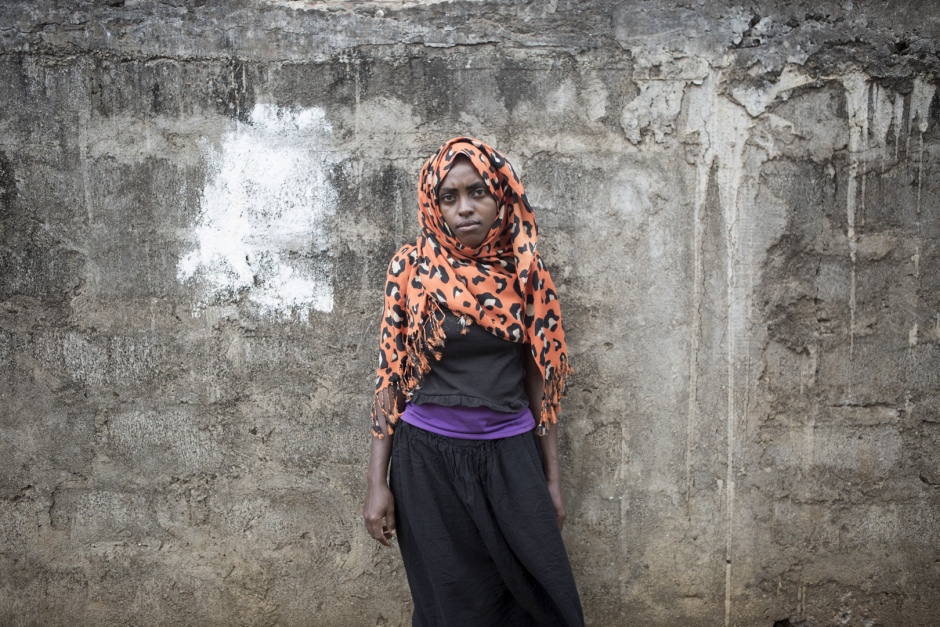 Comoros, Mohéli Island, Fomboni, October 16 2015Markize Bouchrane, 15 years old."When I was 12, I was in a secret relationship with my boyfriend, and I get pregnant. My parents told us to get maried, I had no choice. At this time, I was in second year in middle school and I had to quit. I get back to it, but I get pregnant again. My second-born is 5 months now and I start again, my mother helps me. My father too, when he can (he is a fisherman). I live with her and the two kids. My jusband left three months ago to Anjouan, I don't why. I thought he was coming back, but two days ago he call to tell me he wasn't."