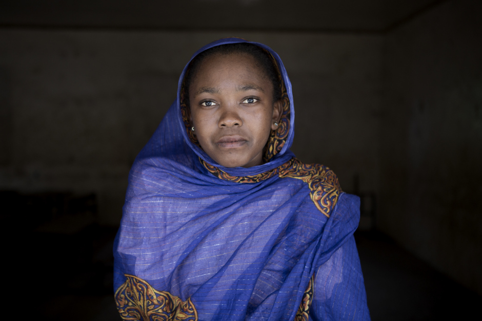 Comoros, Anjouan Island, Kiyo, October 16 2015Hadissati Kamar, 20 years old."When I was 16, I was in a relationship with a boy from the University. We were decided to continue our studies and get maried after. Our parents learn about us and forced us to have a wedding. I get pregnant just after that, and we had a child. A few time later, my husband left us becuause of my family who were impossible with him. They said he dishonored me. We try to see each other but it was too complicated. Now, I am engaged to another boy who is, like me, in first year of highschool. My family help me with my 3 years old kid. When I grow up, I would like to be a doctor."