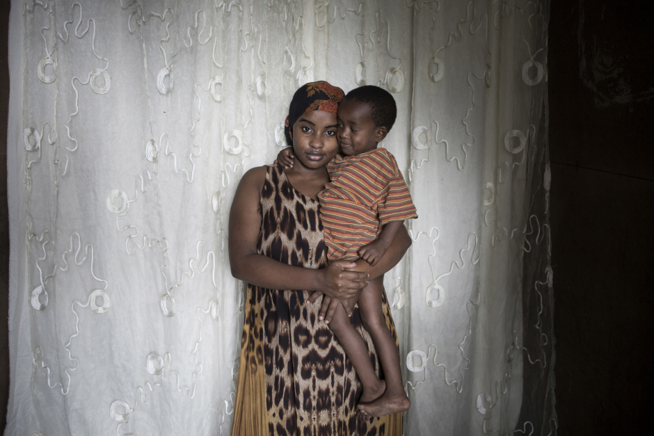 Comoros, Ngazidja Island, Ndaweni, October 19 2015Nadjima Ali, 17 years old."When I was 16, I maried an older man. I wanted to. I had my first child when I was 17 and I left school. I regret that, because now I could have a good job instead of just sew Kofya beanies at home. But it's life."