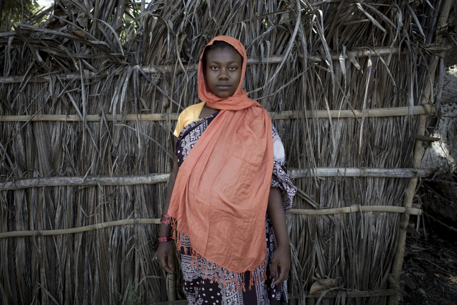 Comoros, Anjouan Island, Nounga, October 10 2015Farzeline Anli, 16 years old."My sister were maried to an old man, and she had children. But one day, she died in childbirth. Our family forced me to marry her husband, so the children will have a mother. They even change my name for my sister's. I really wasn't happy at first, but now it is going better. I am seven months pregnant."