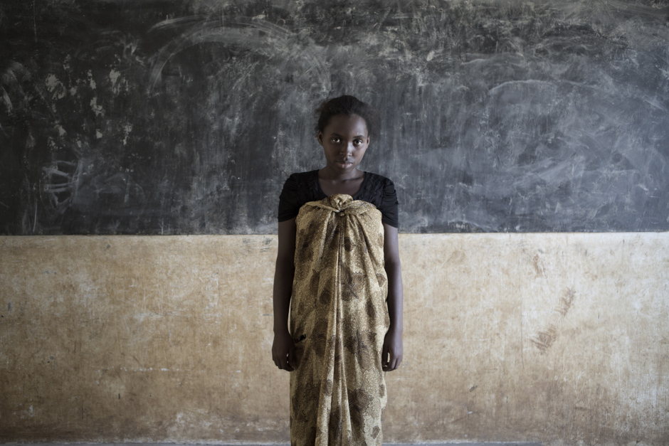 Comoros, Anjouan island, Kiyo, October 12 2015Zaidath Maoulida, 12 years old."I had my child 3 months ago with a school friend. His mother refused we get maried. I accept this child because this is God's will, but I would like to go back to school."