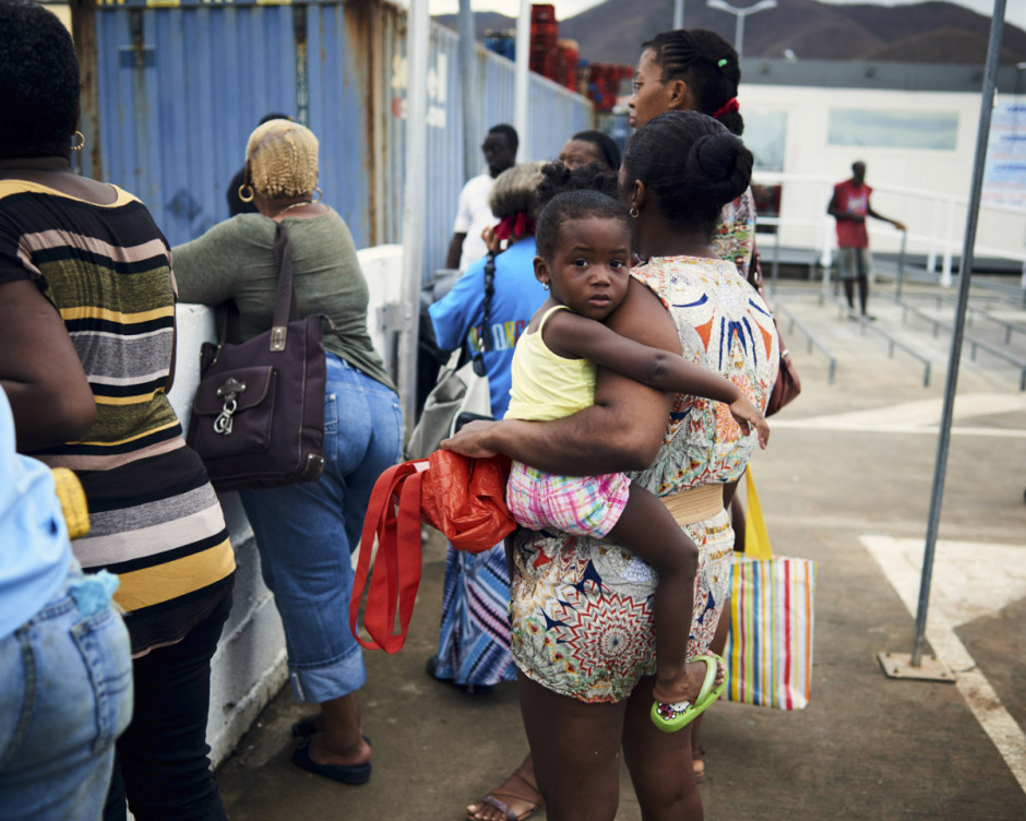 Antilles, Île de Saint-Martin, 15 September 2017 - Irma hurricane. In the Marigaud streets, reopening of a little food shop under the control of the army, each person can filled a little caddy.