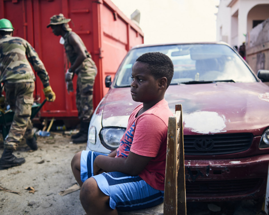 Antilles, Saint-Martin, 19 September 2017 - Irma Hurricane. In the Sandy Ground district. A child is observing the RSMA regiment working.