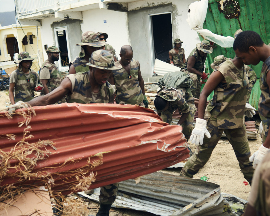 Antilles, Saint-Martin, 19 September 2017
Irma Hurricane. In the Sandy Ground district, RSMA is clearing urgently metal sheets possibly dangerous during Maria's passage announced for the evening. 

Antilles, Saint-Martin, 19 septembre 2017
Ouragan Irma. Dans le quartier de Sandy Ground, RSMA deblaye en urgence les toles pouvant Ítre dangereuse au passage de Maria annoncÈ pour la soirÈe.

Cyril Zannettacci / Agence VU