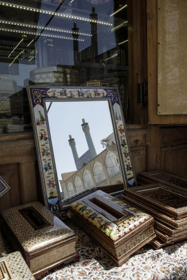 Iran, Isfahan, August 2015 - Naghsh-e Jahan Square or Emam Square. In the mirror, the Emam mosque.