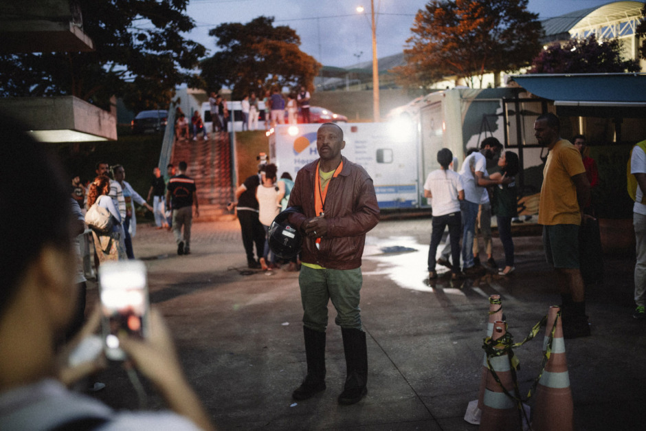 Brazil, Corrego do Feijão, 26 January 2019 - Man records a video in support of victims of the tragedy at a victim support center.