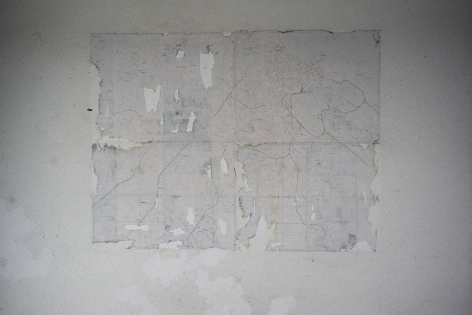 Cuba, Havana, January 11, 2019 - From the series “Sierra Maestra“. Aged Havana city's maps on the wall of one of the apartment of the Sierra Maestra's building.