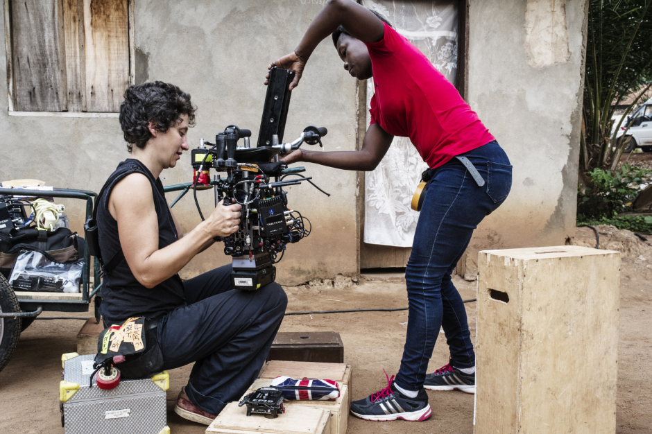 Central Africa, Bangui, 14 November 2018On the movie set of the film "Camille", by Boris Lojkine in Central Africa.Hélène Degrandcourt, first picture assistant and Leila Thiam (right), camera assistant trained by the Varan Workshop Program, are preparing the camera for the shooting of a scene in Bangui.République Centrafricaine, Bangui, 14 novembre 2018Tournage du film "Camille" de Boris Lojkine en Centrafrique.Hélène Degrandcourt, 1ère assistante opérateur prise de vue et Leila Thiam (d), assistante caméra, formée par le programme des ateliers Varan, préparent la caméra avant le tournage d'une scène à Bangui.Michael Zumstein / Agence VU