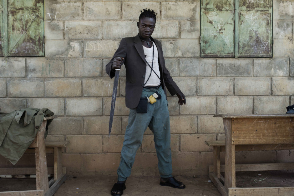Central African Republic, 15 December 2013Member of the "Mouvement de Revolte des Forces ArmÈes Centrafricaine pour le Peuple", posing with his weapon, in a school of the outskirts of Bangui.RÈpublique centrafricaine, 15 dÈcembre 2013Un homme du "Mouvement de Revolte des Forces ArmÈes Centrafricaine pour le Peuple", pose avec son arme dans une Ècole des faubourgs de Bangui.Michael Zumstein / Agence VU