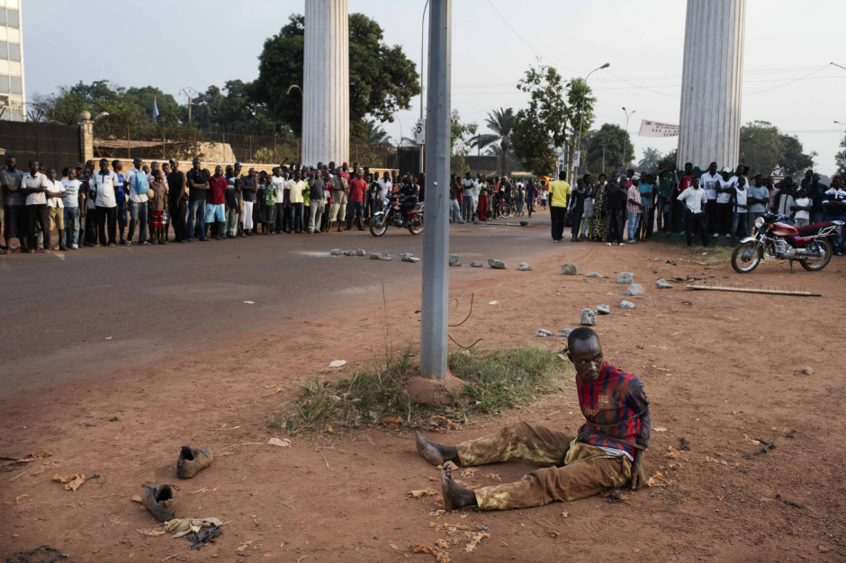 Central African Republic, Bangui, 12 January 2014Next to the United Nations roundabout, a man holding grenades was arrested by the African-led International Support Mission to the Central African Republic (MISCA) Forces of Burundian.République Centrafricaine, Bangui, 12 Janvier 2014Près du rond point des Nations Unies, un homme transportant des grenades est arrété par les forces de la Mission internationale de soutien à la Centrafrique (MISCA) Burundaise.Michael Zumstein / Agence VU