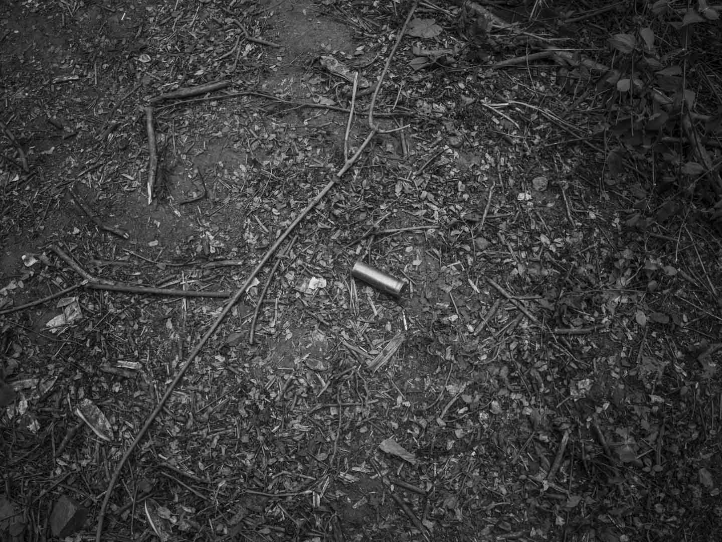 Brazil, Rio de Janeiro, 29 October 2025 - Traces of blood and weapons used in combat with security forces on the dirt floor in the middle of a forest separating the Penha Complex from the Alemão Complex after the deadliest police operation in the history of Rio de Janeiro, where at least 126 people were killed.