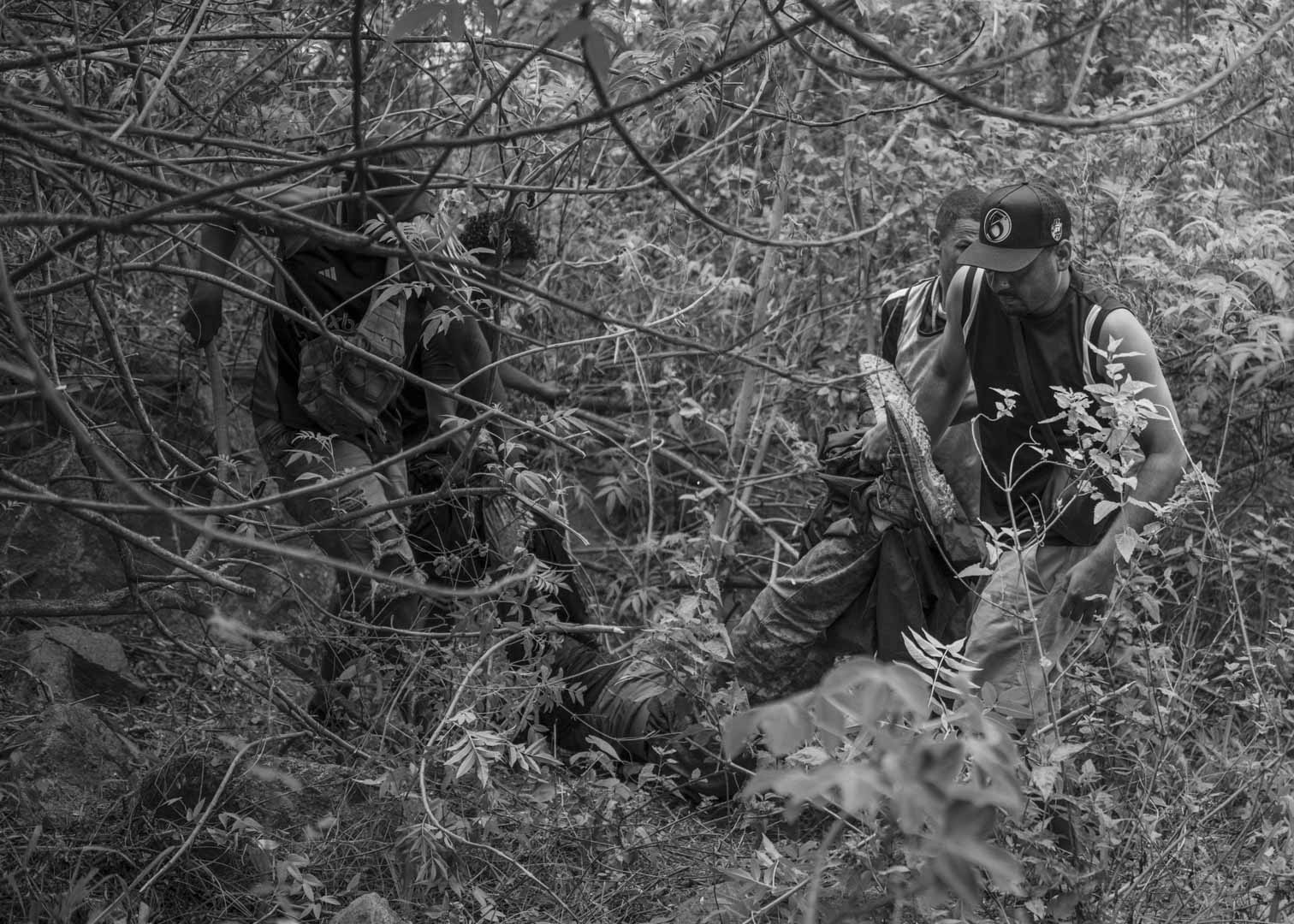 Brazil, Rio de Janeiro, 29 October 2025 - Residents and relatives of missing persons recover bodies in the forest separating the Penha Complex from the Alemão Complex after the deadliest police operation in the history of Rio de Janeiro, where at least 126 people were killed.