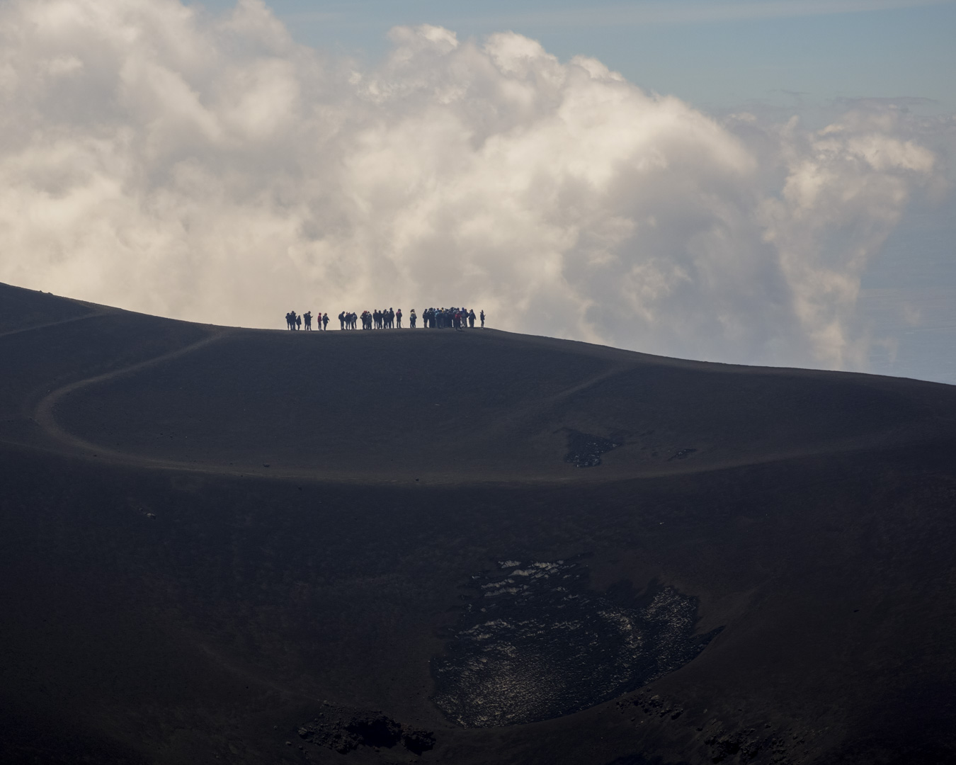 Italy, Sicily, 29 May 2025 - Tourists on Mount Etna